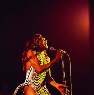 Tina Turner of the Ike & Tina Turner Revue performs live on stage at the Hammersmith Odeon in London on 24th October 1975.