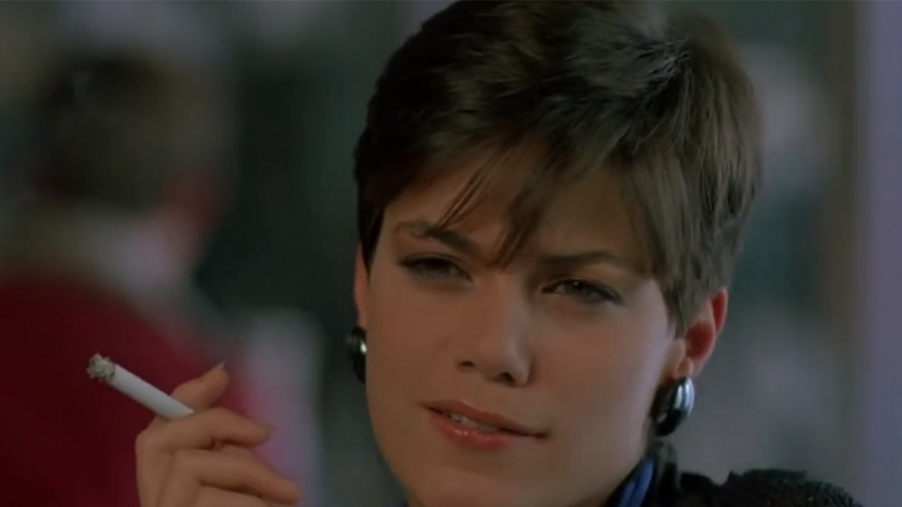 Linda Fiorentino smoking a cigarette in Gotcha!