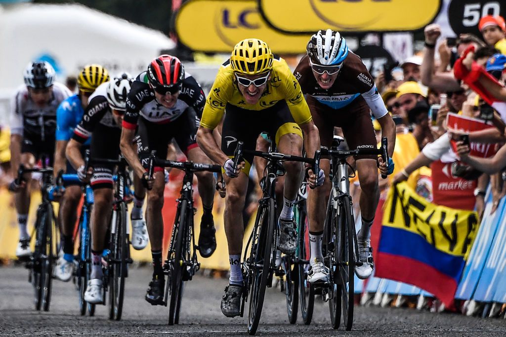 Geraint Thomas sprints in for second