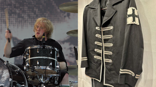 Bob Bryar of My Chemical Romance next to his Black Parade era suit