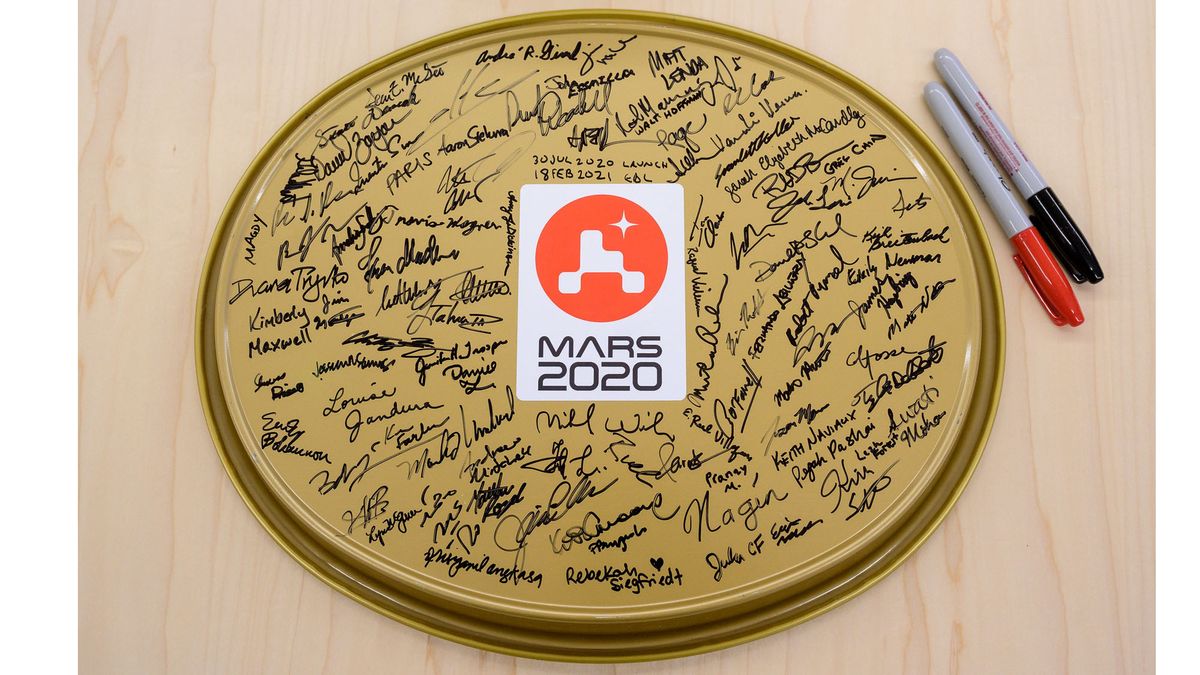 To commemorate the Mars 2020 mission, members of the Perseverance Mars rover team signed a gold serving tray at NASA's Jet Propulsion Laboratory in Pasadena, California. The team members signed the tray on Feb. 18, following Perservance&rsquo;s successful landing on the Red Planet.