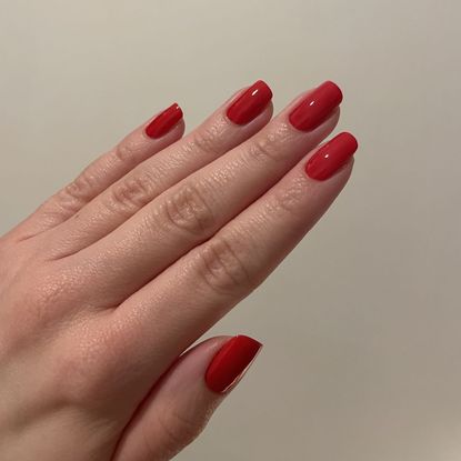 valeza with red nails and jones road the nail polish kit