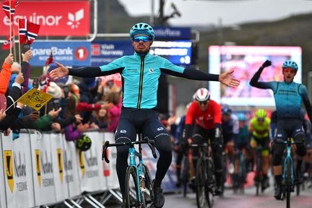 Arctic Tour of Norway: Michele Gazzoli of Astana Qazaqstan celebrates at finish line as stage 2 winner ahead of teammate Christian Scaroni in second