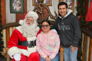 Christine and Robert with Santa at Disneyland