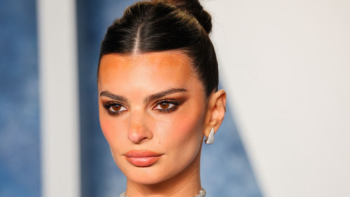 Emily Ratajkowski Did A Cover Shoot In Nothing But A Gold Necklace And Skirt, But Seriously How Does It Stay On?
