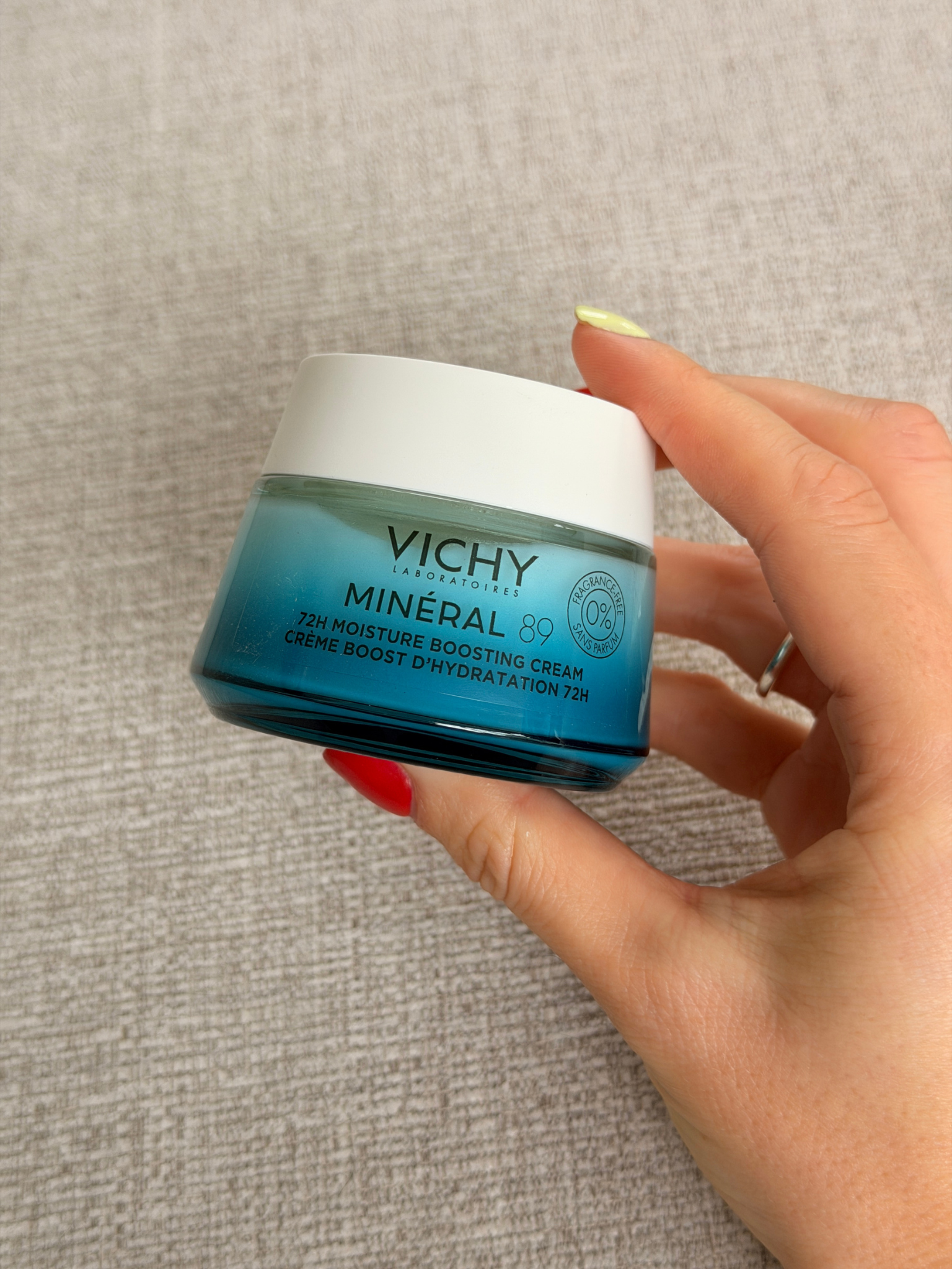 Freelance beauty editor Grace Day holding the Vichy moisturiser