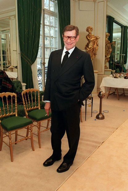 Yves Saint Laurent in one of his Paris showrooms