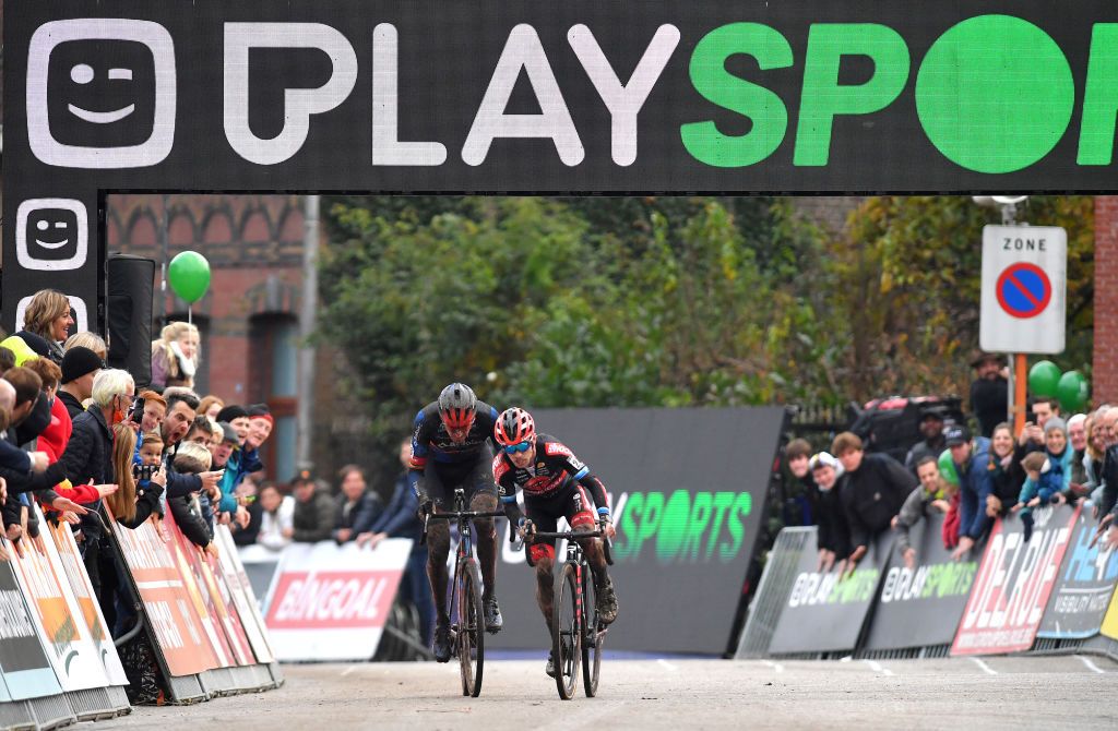 NIEL BELGIUM NOVEMBER 11 LR Toon Aerts of Belgium and Team Baloise Trek Lions and Eli Iserbyt of Belgium and Team Pauwels Sauzen Bingoal sprint at finish line during the 30th Superprestige Niel Jaarmarktcross 2021 Mens Elite SPNiel Superprestige2022 on November 11 2021 in Niel Belgium Photo by Luc ClaessenGetty Images