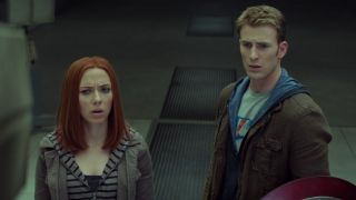 From left to right: Scarlett Johansson looking shocked and Chris Evans looking a bit concerned in Captain America: The Winter Soldier.