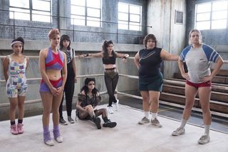 The GLOW wrestlers (from left to right): Fortune Cookie, Britannica, Scab, She Wolf, Melrose, Macchu Picchu and Vicky the Viking