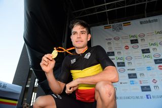 Wout van Aert on the podium after winning the Belgian time trial championship