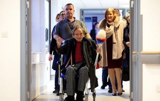 ir Ken Dodd tickled pink as he leaves hospital after six-week stint