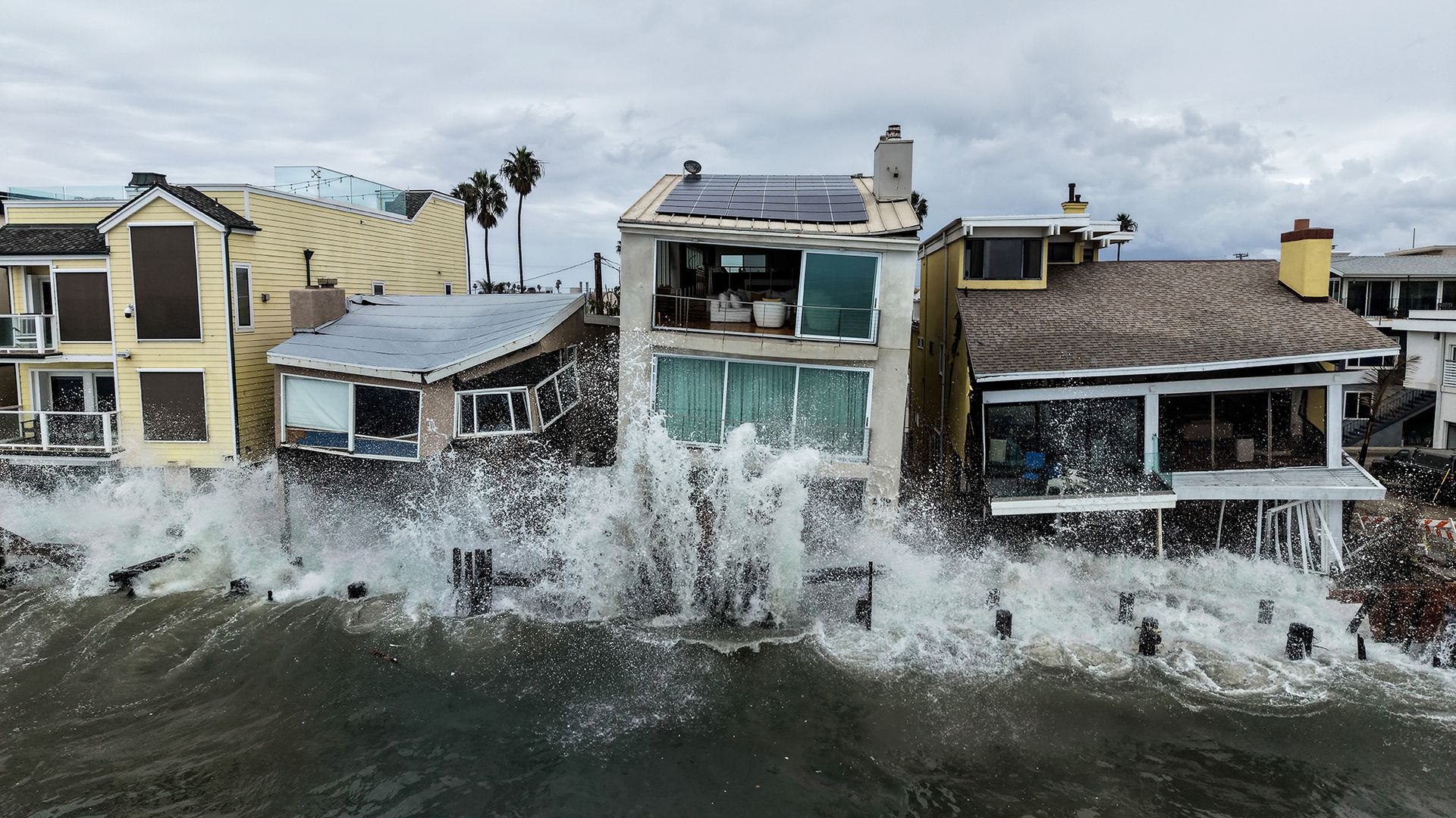 Waves from post-tropical cyclone Storm Rachel crash into beachfront homes in Long Beach, California