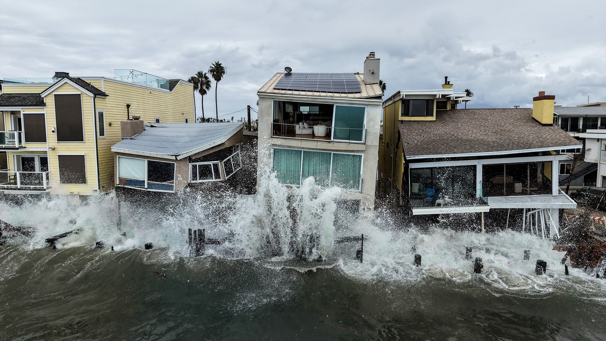 Waves from post-tropical cyclone Storm Rachel crash into beachfront homes in Long Beach, California