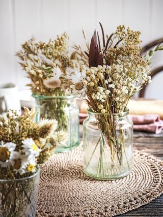 Dried flower arrangements in vases