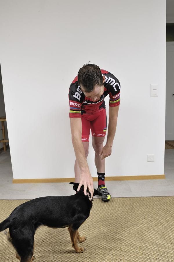 Cadel Evans takes time out from the Procycling shoot at his home.