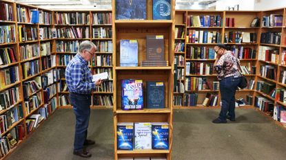People look around a Half-Price Books store in Dallas, Texas.