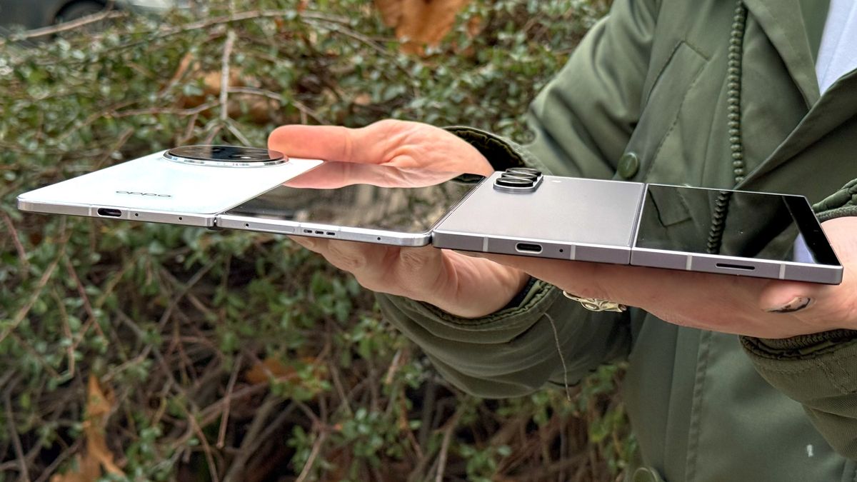 The Oppo Find N5 (left) and Samsung Galaxy Z Fold 6 held side-by-side