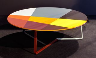 Low circular bold painted table