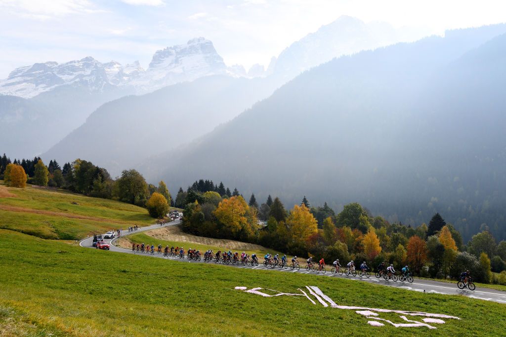 LAGHI DI CANCANO ITALY OCTOBER 22 Peloton Dolomites Southern Limestone Alps Mountains Forest Autumn Landscape during the 103rd Giro dItalia 2020 Stage 18 a 207km stage from Pinzolo to Laghi di Cancano Parco Nazionale dello Stelvio 1945m girodiitalia Giro on October 22 2020 in Laghi di Cancano Italy Photo by Tim de WaeleGetty Images