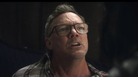 Matthew Lillard's Mr. Charles in his bed talking to Jessica Jones in Daredevil: Born Again. 