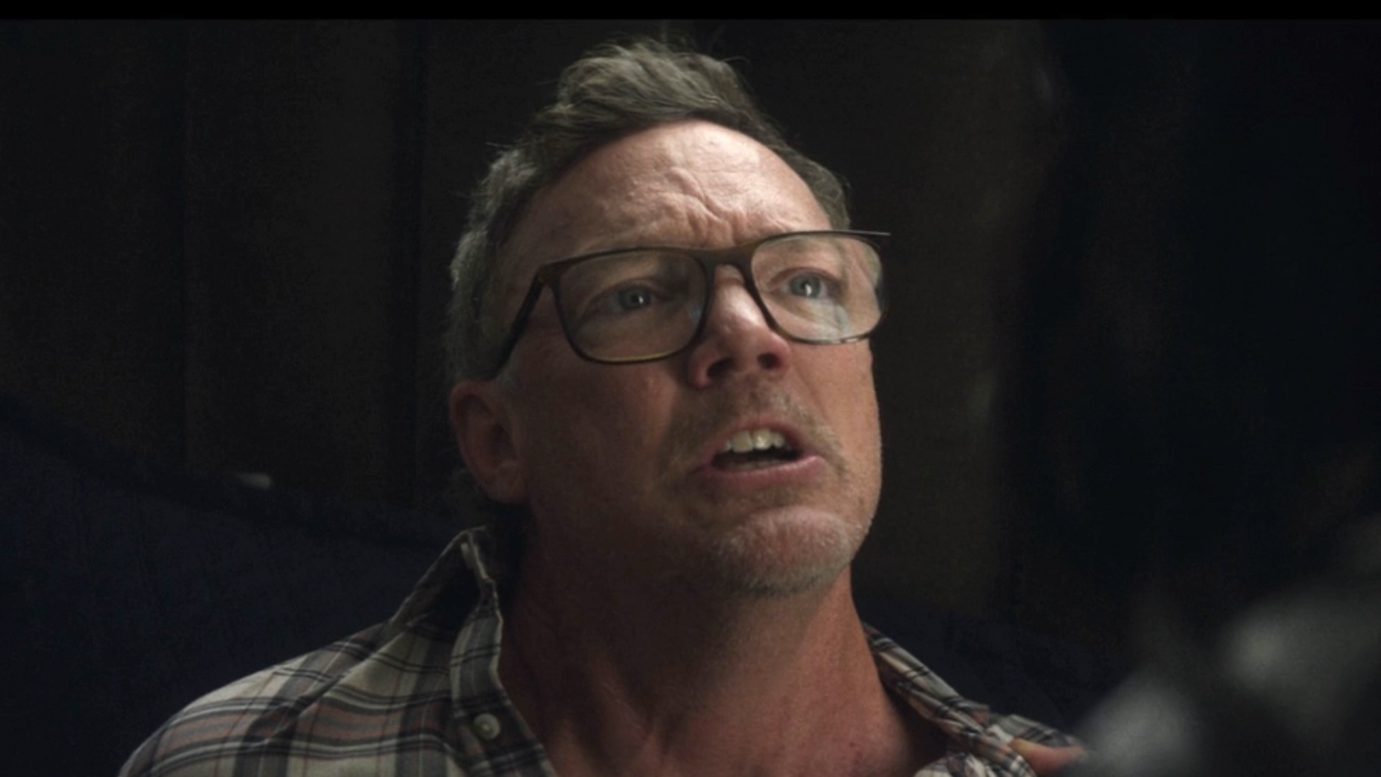 Matthew Lillard's Mr. Charles in his bed talking to Jessica Jones in Daredevil: Born Again. 