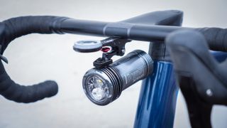 An Exposure front light mounted to a K-Edge combo mount on the one-piece cockpit of a Ridley Kanzo
