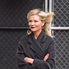 Kirsten Dunst is seen arriving at 'Jimmy Kimmel Live' Show on April 04, wearing a celine bag