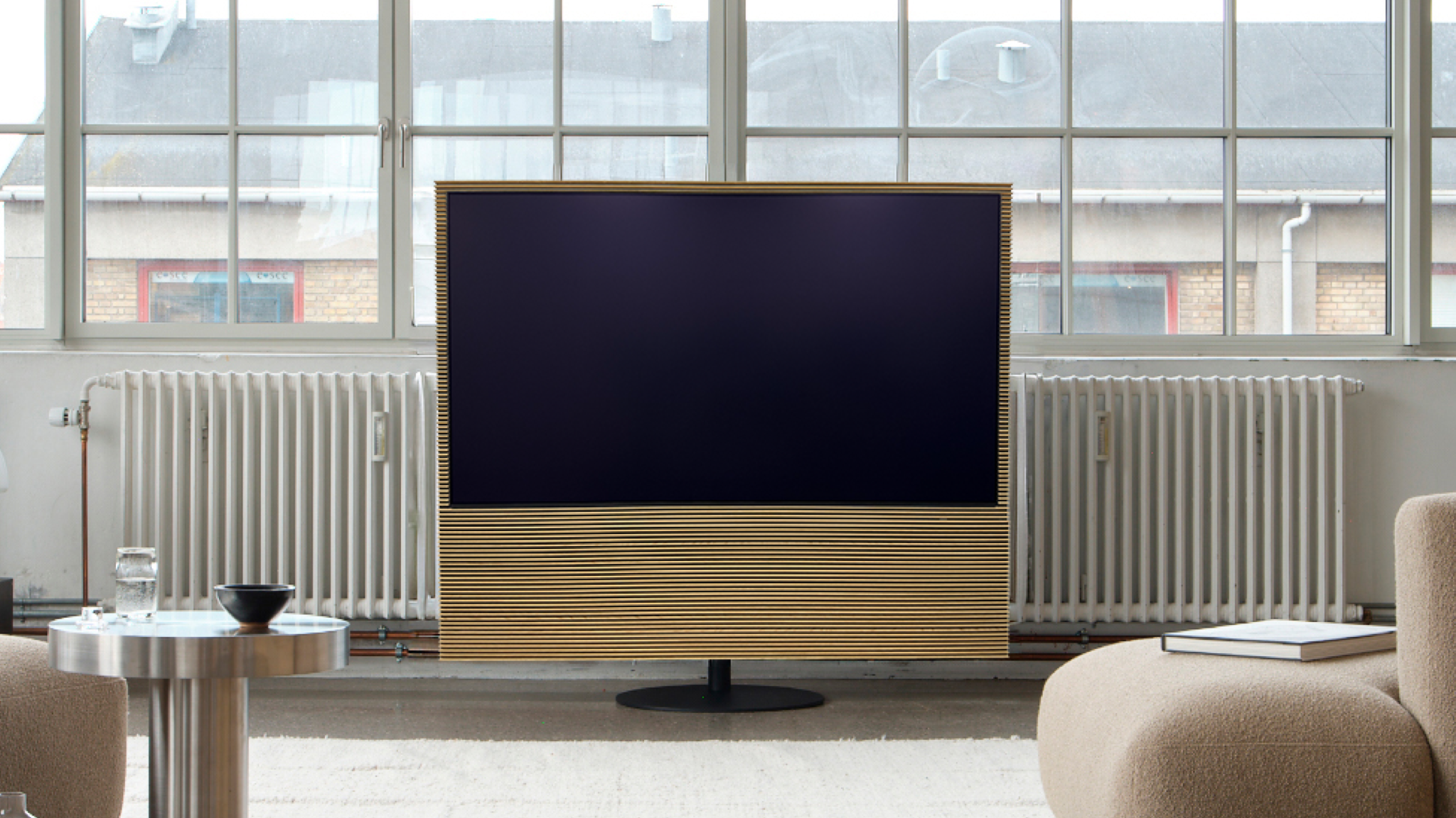 Samsung HiFi S99H on its stand in a neutrally decorated room