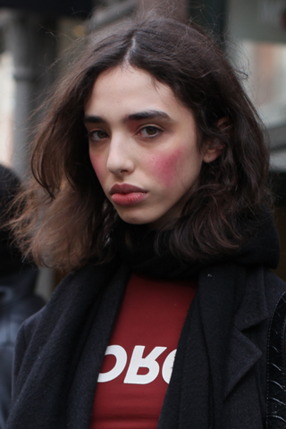 Woman at london fashion week bold blush