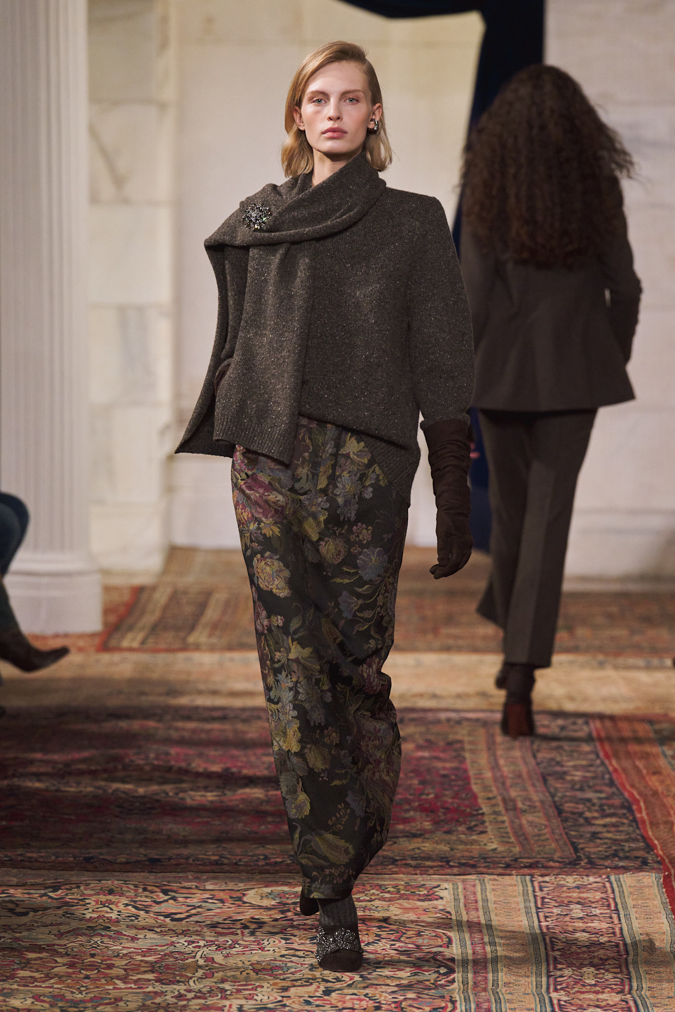 A model in the Ralph Lauren Fall 2026 show wearing vintage-looking florals