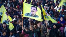 PKK supporters wave flags of founder Abdullah Ocalan