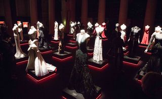 The exhibit's theme of red carpet dressing was given a subtle nod with black platforms lined with red LEDs