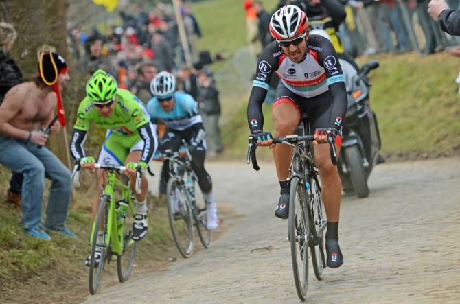 Peter Sagan can only watch as Fabian Cancellara goes clear