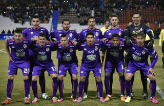Real Potosí players line up ahead of a Copa Sudamericana match against Universidad Católica in August 2016.