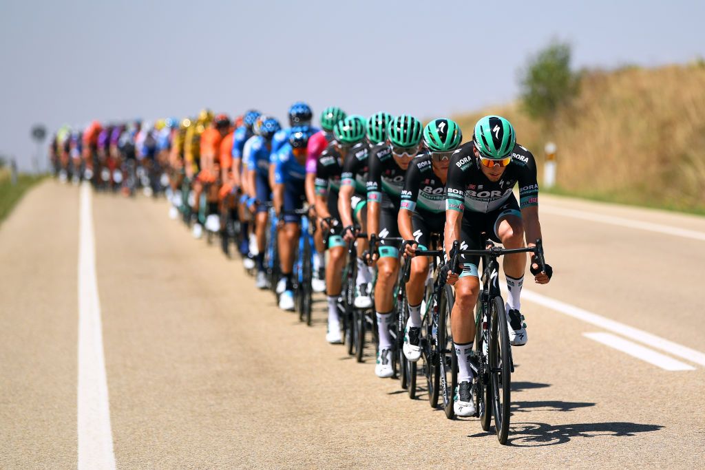 Bora-Hansgrohe lead the peloton on stage 2