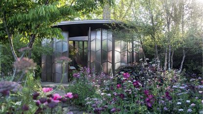 Chelsea Flower Show 2026 garden structure surrounded by blooming flower beds