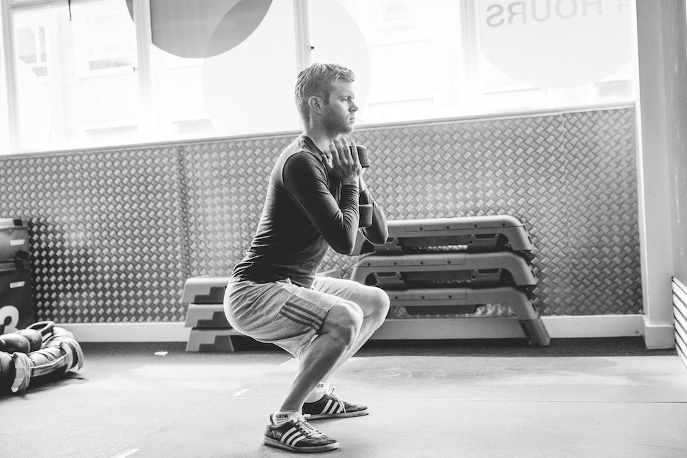 Me performing a Goblet Squat. Martin Evan's emphasized the importance of good posture and form at all times