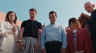 Tea Leoni, Will Poulter, Paul Rudd, Jenna Ortega and Anthony Carrigan standing over a dead unicorn in Death of a Unicorn