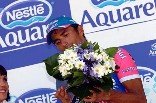 They have nice flowers in France Bennati admires his bouquet