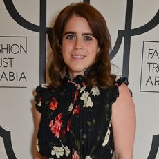 Princess Eugenie of York wearing a black floral maxi dress and black pumps at the FTA dinner in celebration in London June 2024