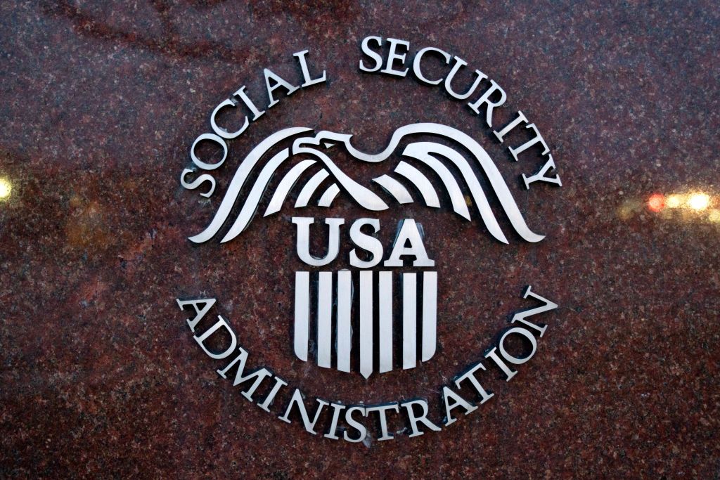 The seal of the US Social Security Administration outside the agency&#039;s headquarters in Woodlawn, Maryland, US, on Wednesday, Feb. 19, 2025. The acting commissioner of the Social Security Administration and her top deputy have left following a confrontation with Elon Musk&#039;s Department of Government Efficiency team over access to data on 70 million beneficiaries, according to people familiar with the moves. Photographer: Stefani Reynolds/Bloomberg via Getty Images