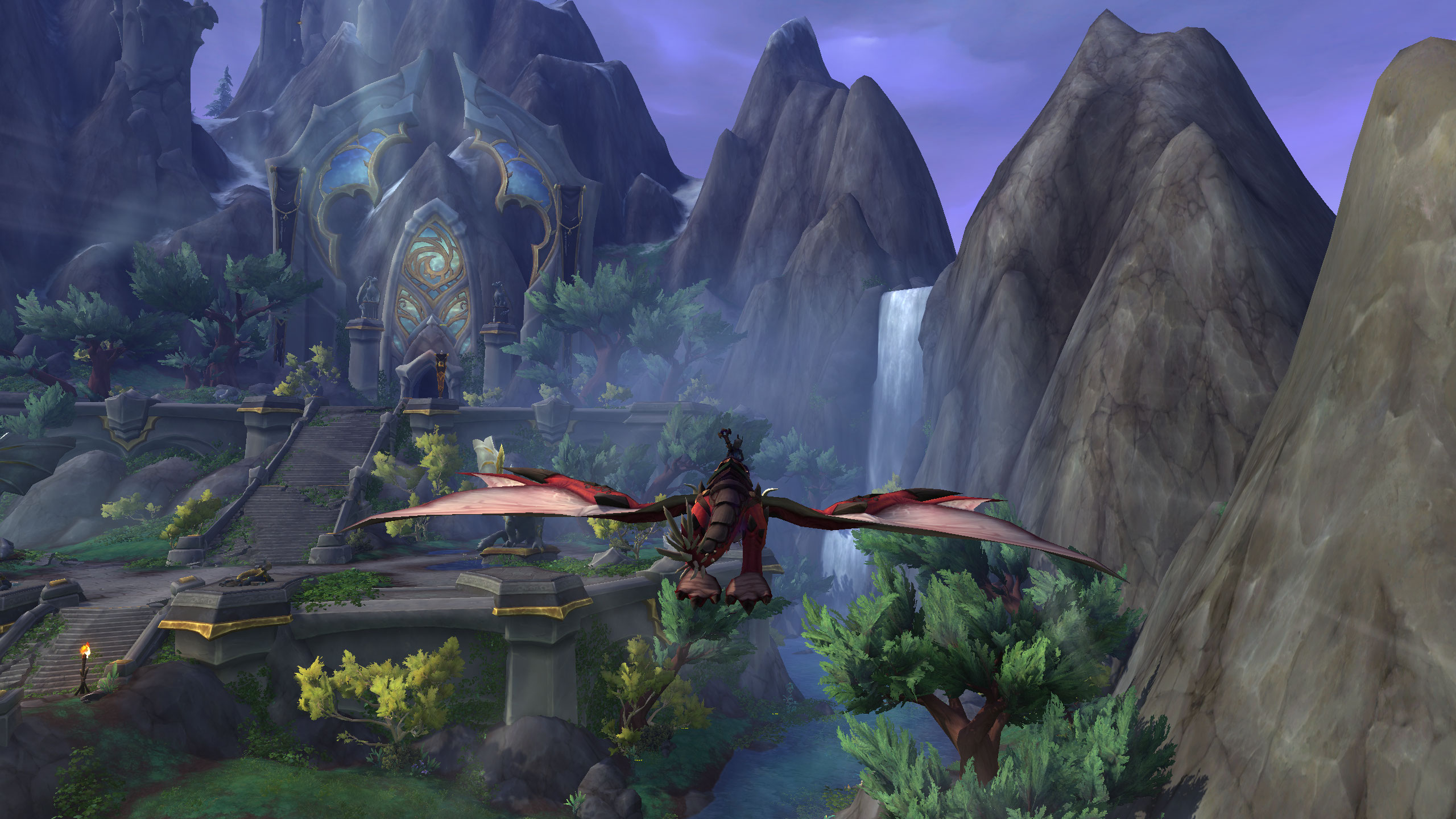 a player is flying a dragon towards a building carved into a mountain