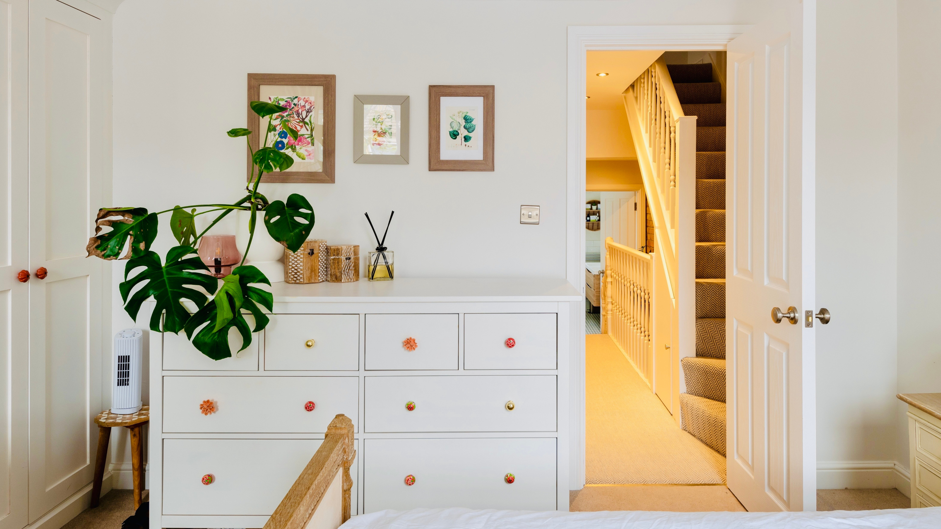 bedroom with white chest of drawers