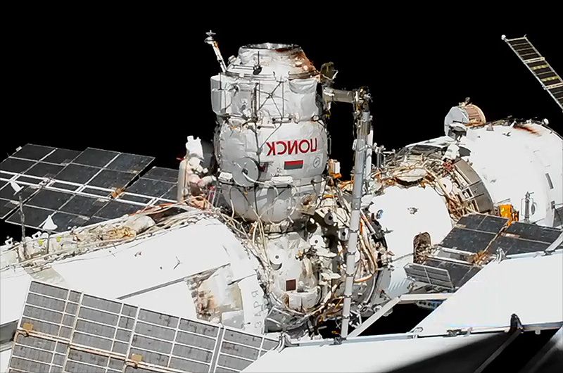 Cosmonauts prep space station for module removal on spacewalk out of new airlock