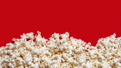 Popcorn on red background