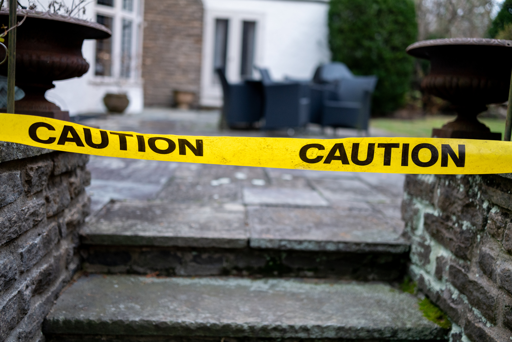 Crime scene tape at a house