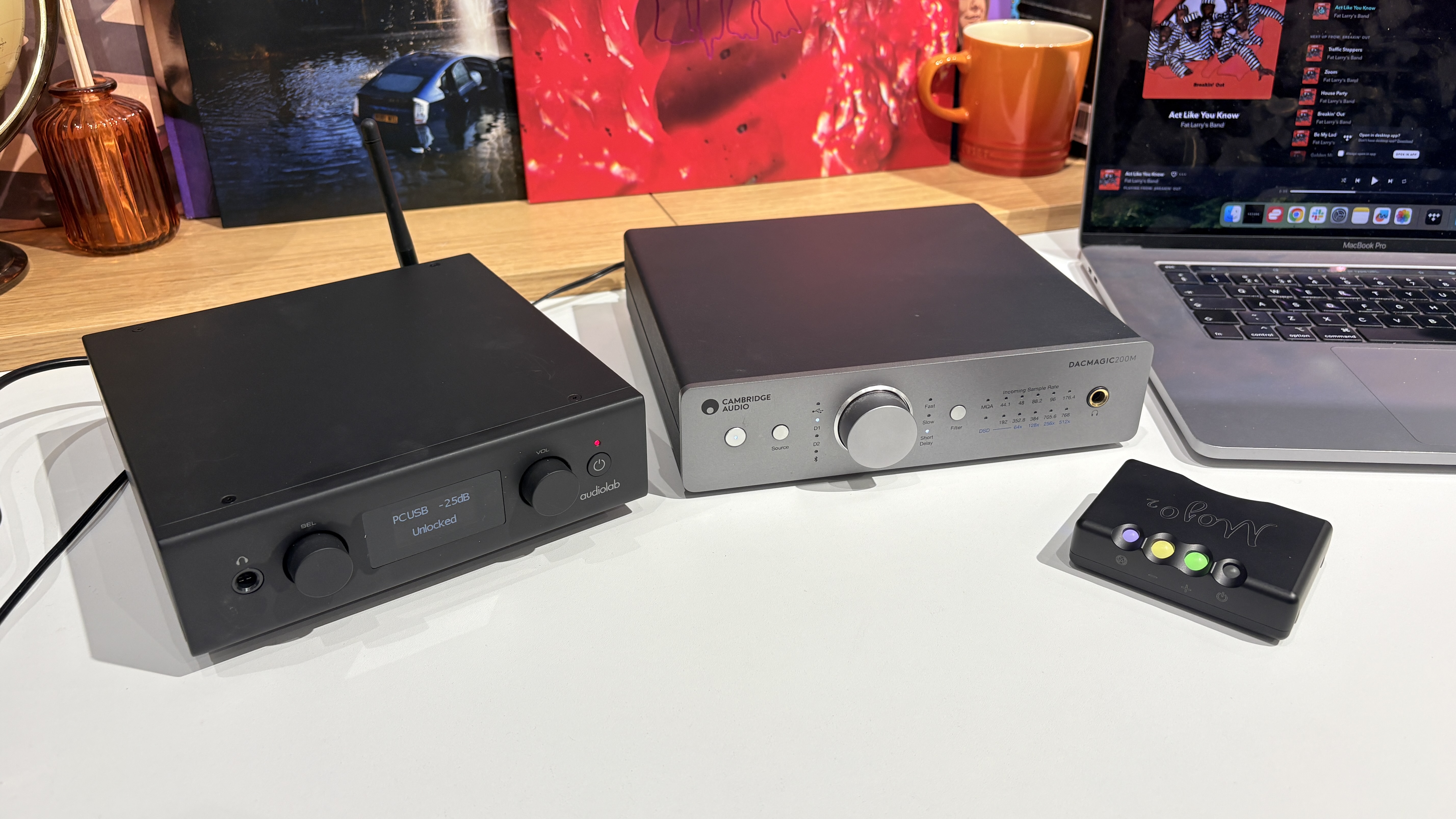 Audiolab D7, Cambridge Audio DacMagic 200M and Chord Mojo 2 DACs on white desk