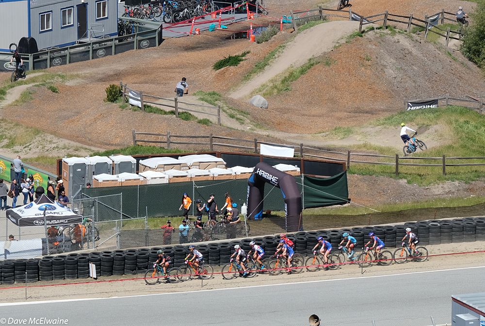 Erin Huck (Construction Zone) leading a group of ten back to the start/finish during second lap
