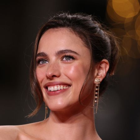 Margaret Qualley wears a Chanel dress and flats on the red carpet in Cannes